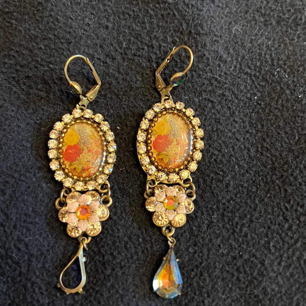 Vintage style dangling earrings. Lower hanging stone is missing.
